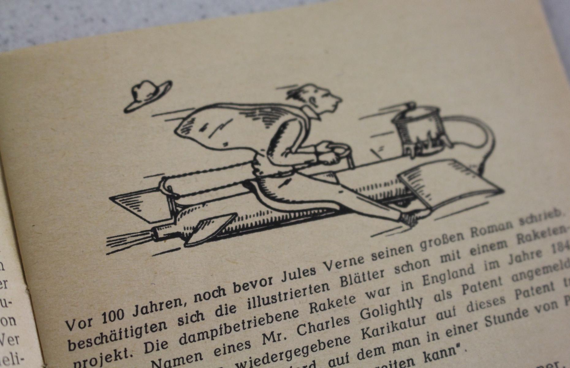 Das Bild zeigt eine Illustration aus dem Heft. Abgebildet ist ein Mann auf einem raketenähnlichen Objekt, welchem allen anschein nach mit einem Ofen betrieben wird. Das Bild scheint sich eines unterhaltenden Charakters zu bedinen.